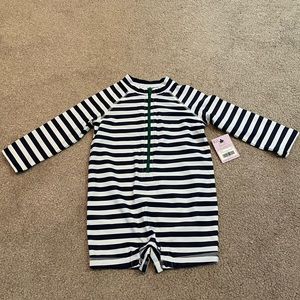 Primary—Navy/white striped rash guard (6-12 mo)